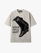 RAW METALS Behind Every Smile Oversized Distressed T-shirt in Bone