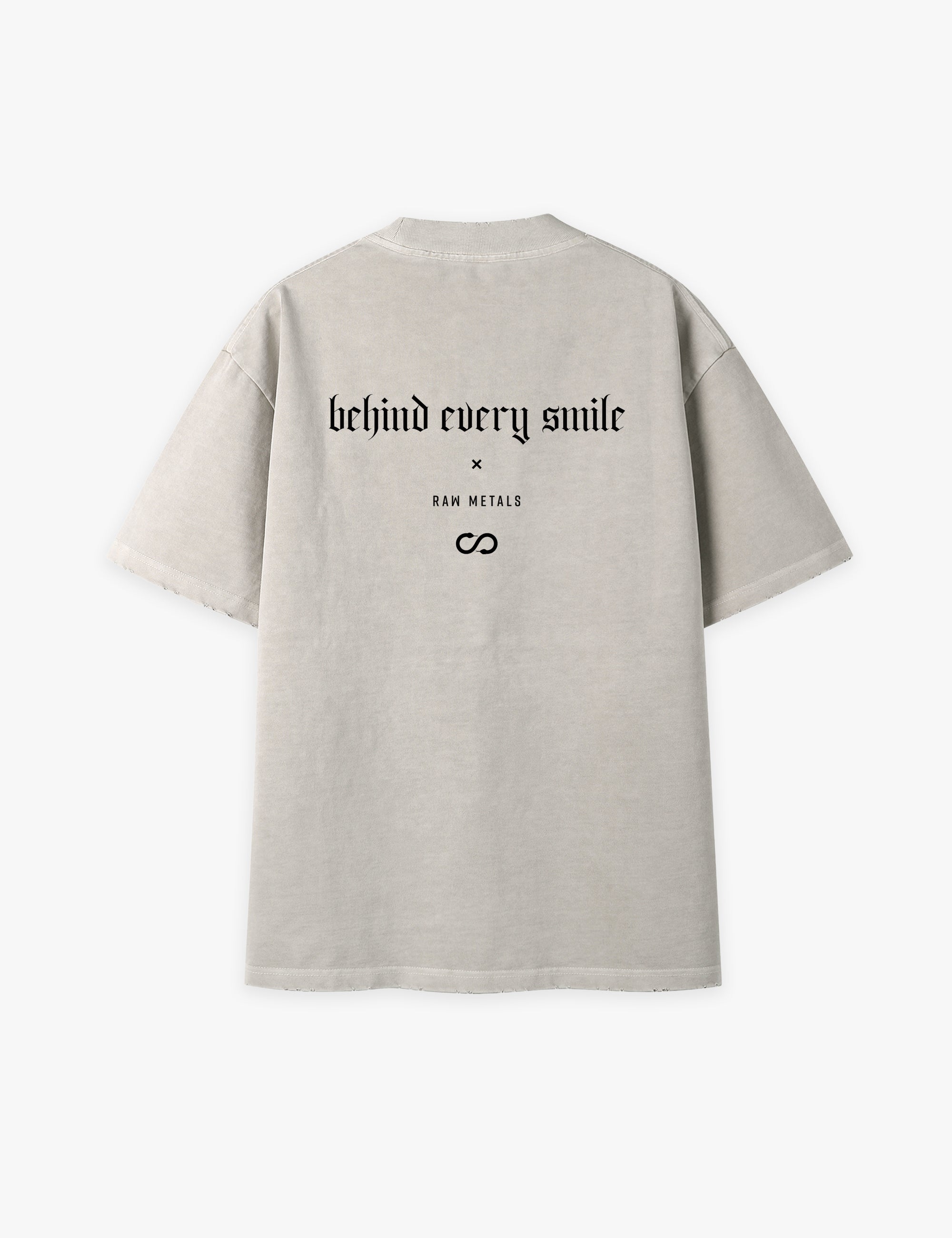 RAW METALS Behind Every Smile Oversized Distressed T-shirt in Bone